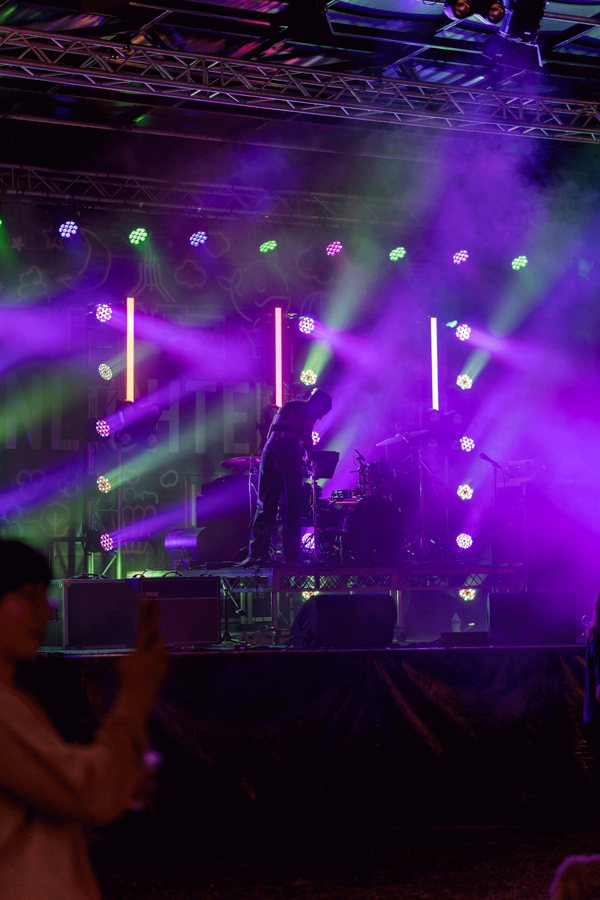 Picture of staff setting up the stage during Enlighten Canberra