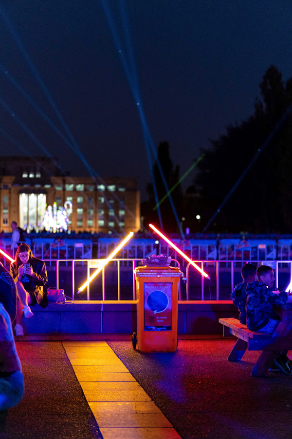 Neon lights illuminating bench area