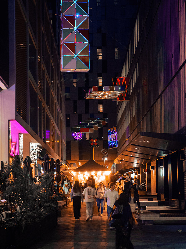 An alleyway in Sydney with restaurants on the sides